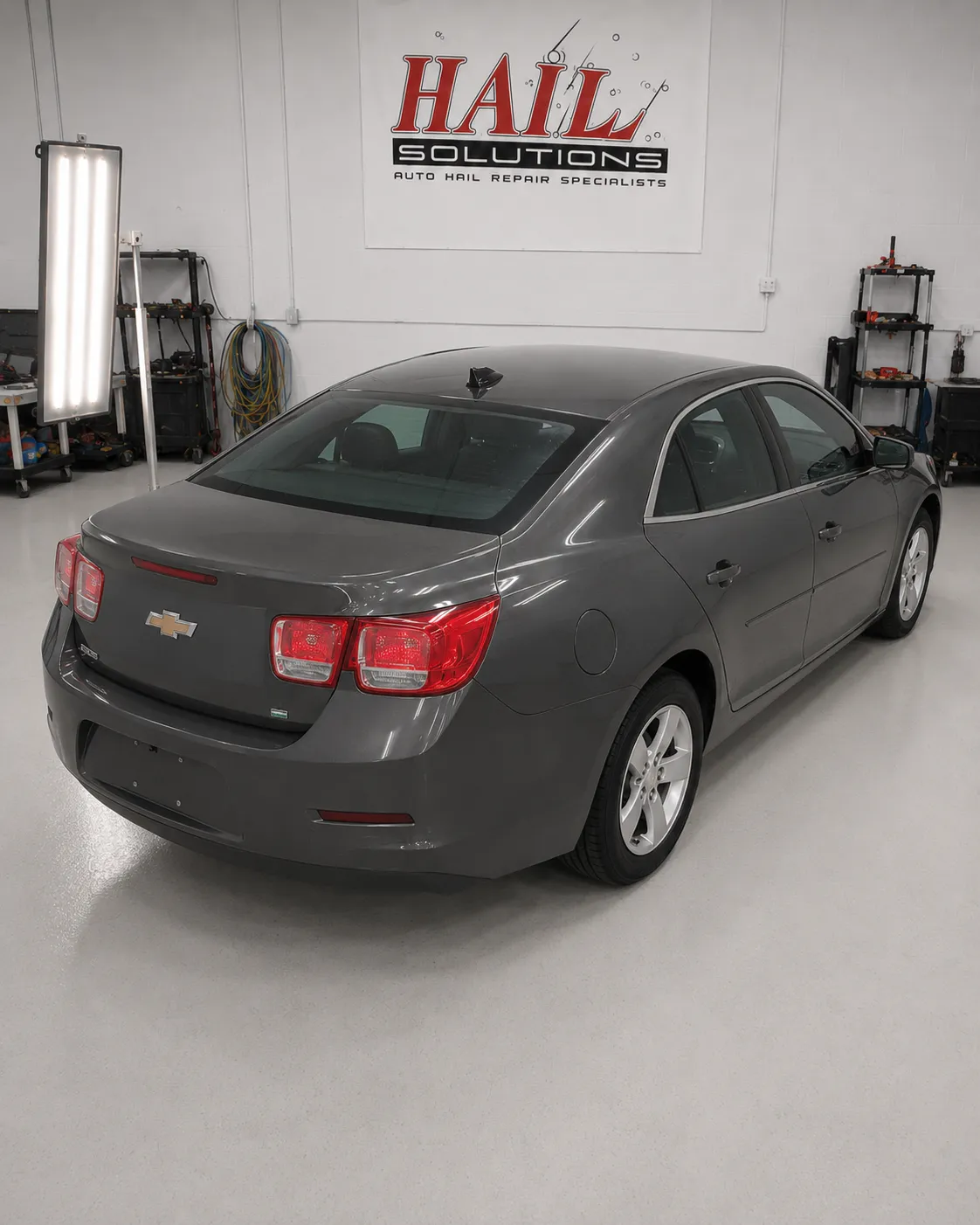 2015 Chevrolet Malibu hail damage repair in Topeka, KS — detail photo 1