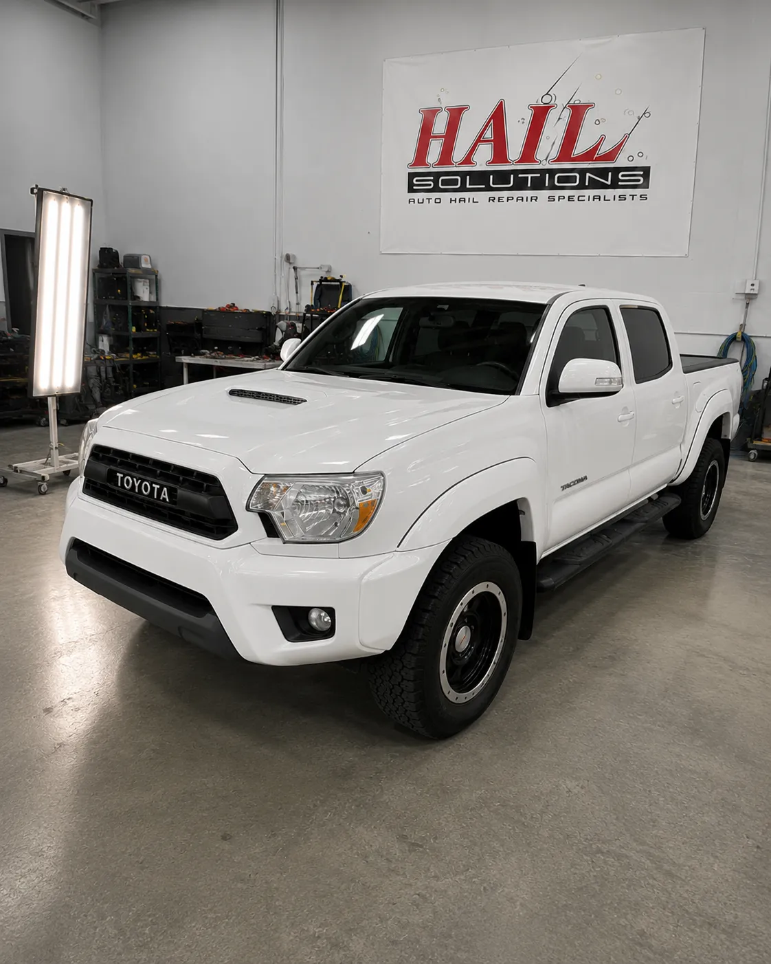 2015 Toyota Tacoma hail damage repair in Raytown, MO — detail photo 1
