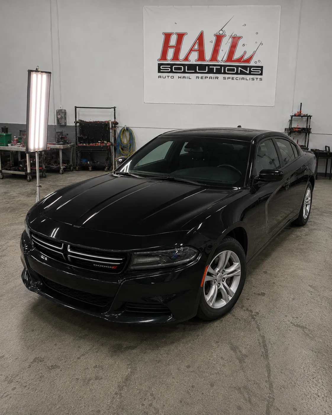 2016 Dodge Charger hail damage repair in Harrisonville, MO — detail photo 1