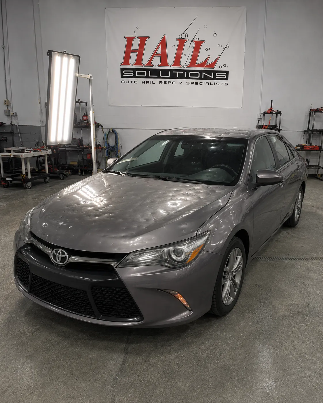 2016 Toyota Camry hail damage repair in Shawnee, KS — detail photo 1