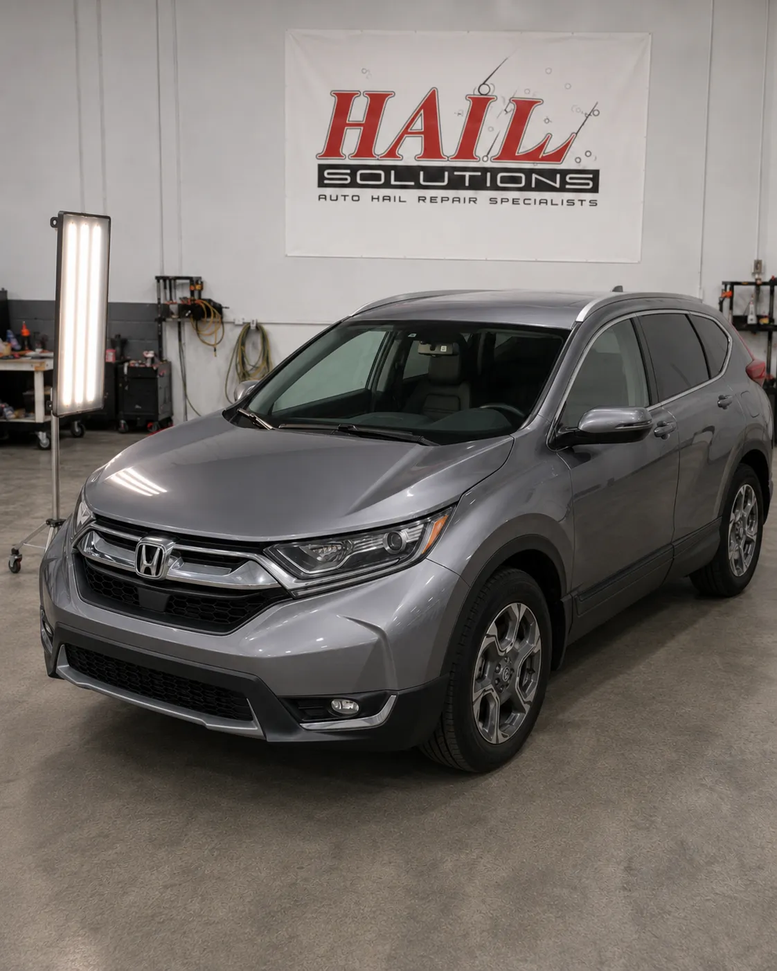 2017 Honda CR-V hail damage repair in Lenexa, KS — detail photo 1