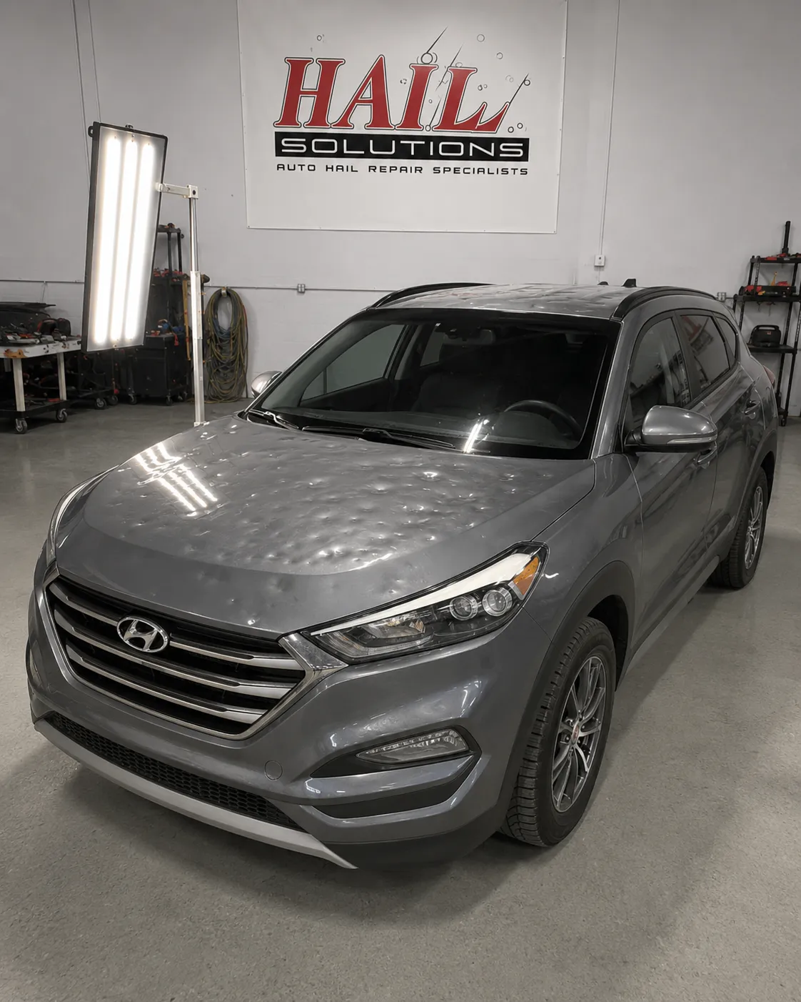 2017 Hyundai Tucson hail damage repair in Shawnee, KS — detail photo 1