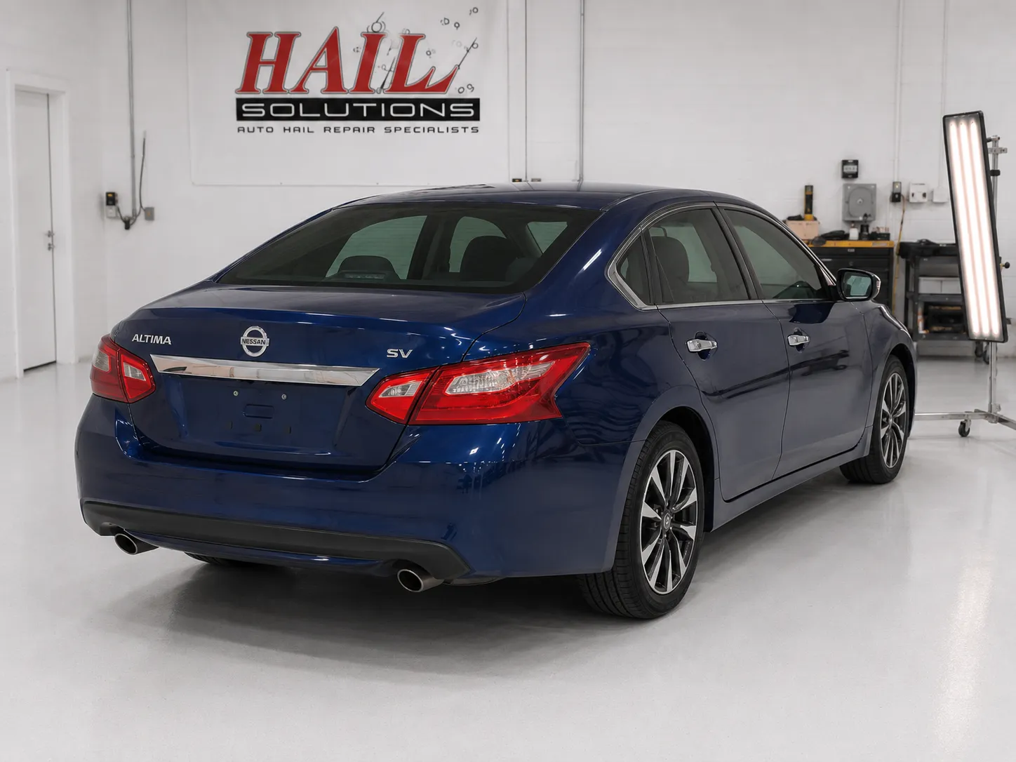 2018 Nissan Altima hail damage repair in Belton, MO — detail photo 1