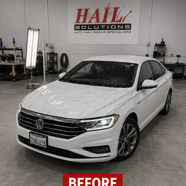2019 Volkswagen Jetta hail damage repair in Paola, KS — detail photo 1