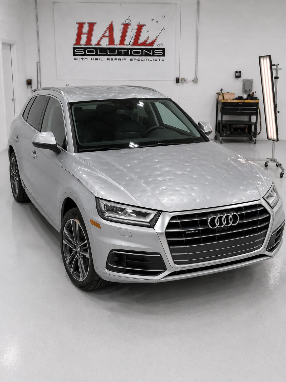 2020 Audi Q5 hail damage repair in Lenexa, KS — detail photo 1