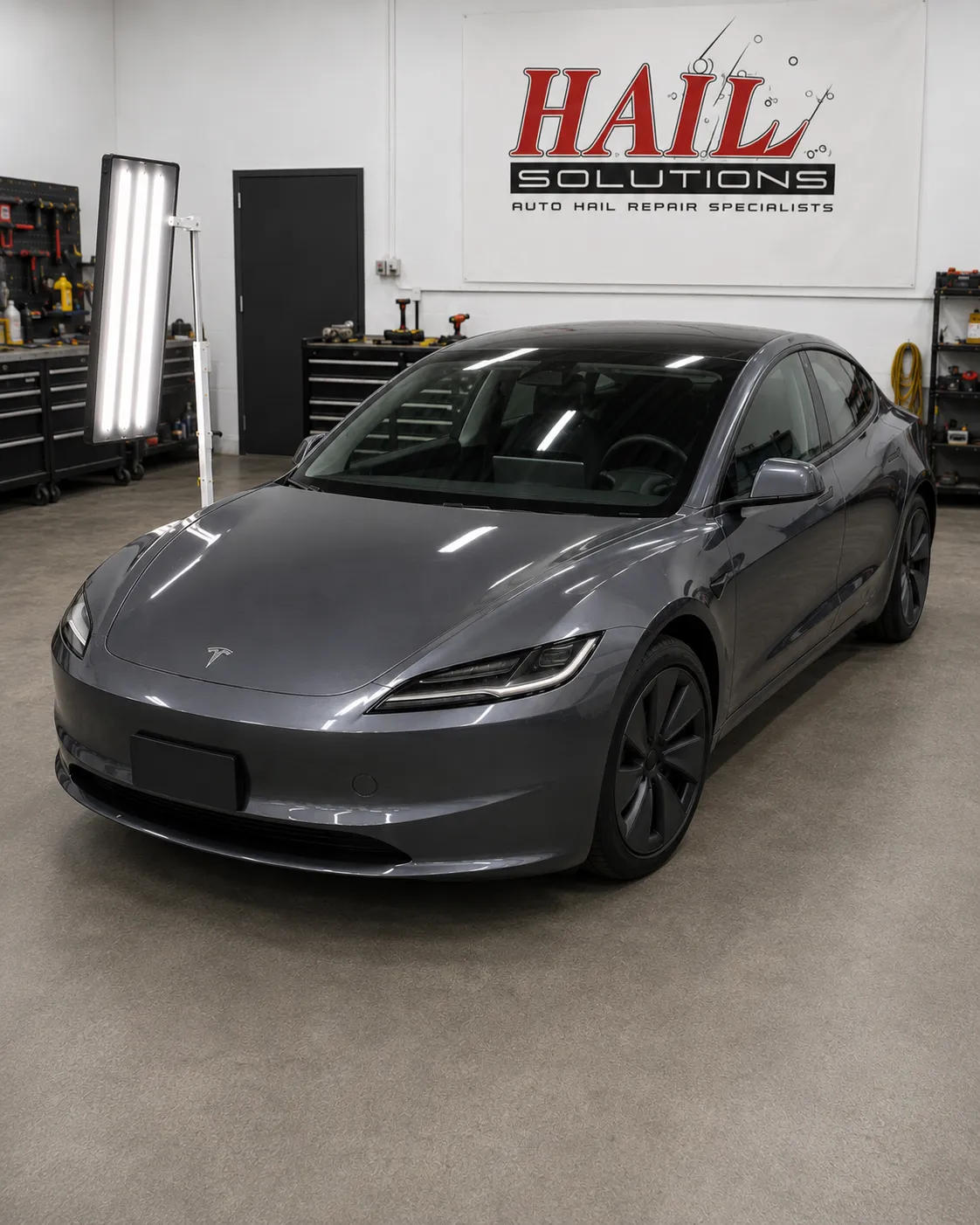 2023 Tesla Model 3 hail damage repair in Leawood, KS — detail photo 1