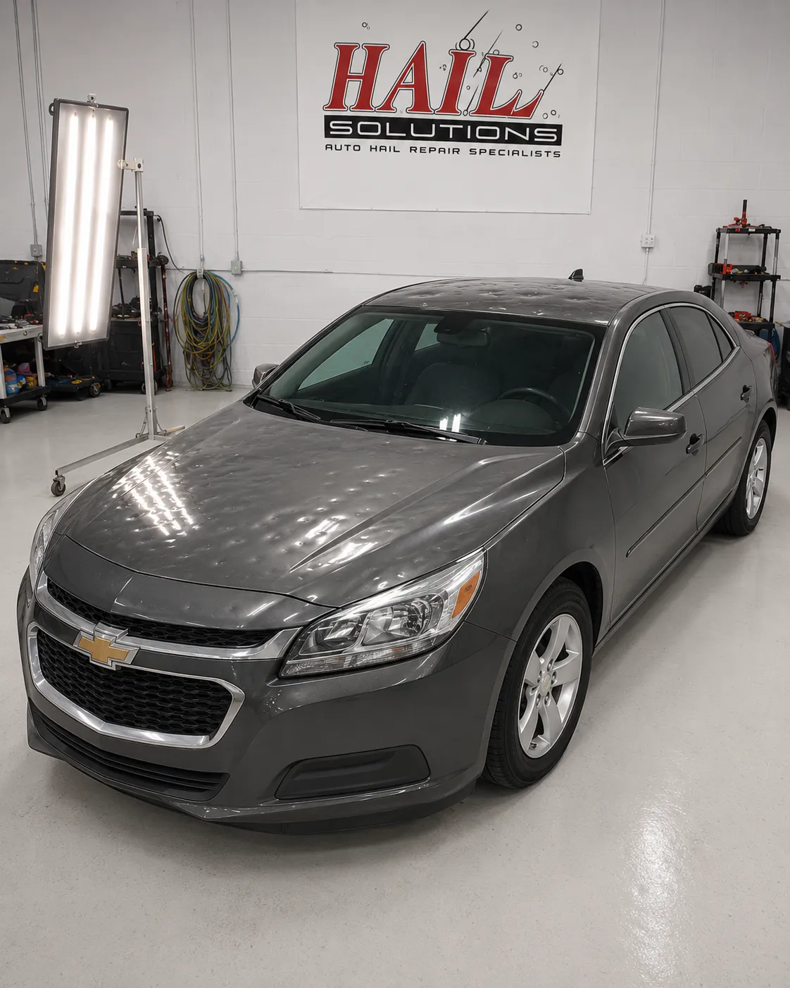 2015 Chevrolet Malibu hail damage repair in Topeka, KS — detail photo 3