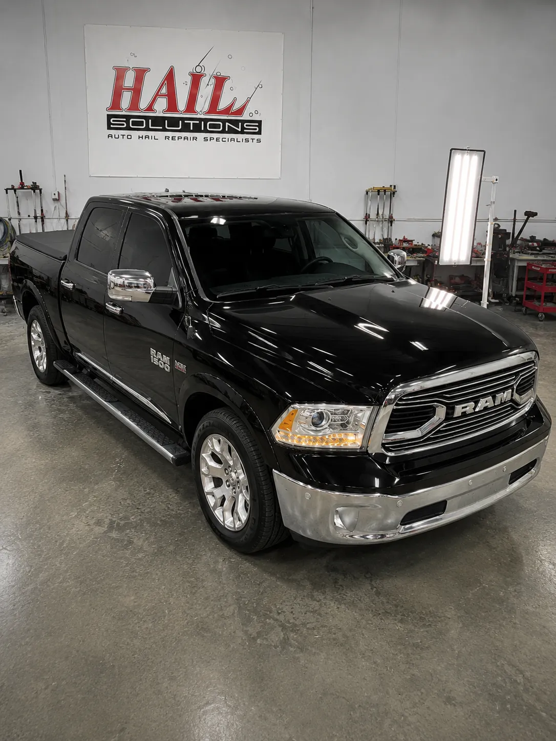 2015 Ram 1500 — Brilliant Black Crystal Pearl hail damage repair in Smithville, MO