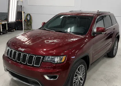 2017 Jeep Grand Cherokee — Velvet Red Pearl restored with paintless dent repair in Prairie Village, KS