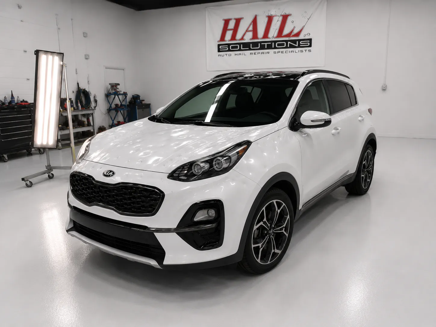 2019 Kia Sportage — Snow White Pearl hail damage repair in Bonner Springs, KS