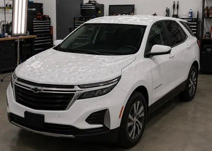 2023 Chevrolet Equinox — Summit White restored with paintless dent repair in Kearney, MO