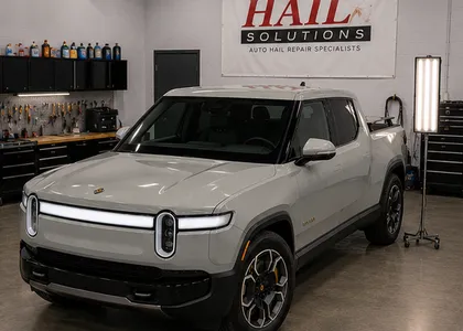 2024 Rivian R1T — Limestone restored with paintless dent repair in Overland Park, KS