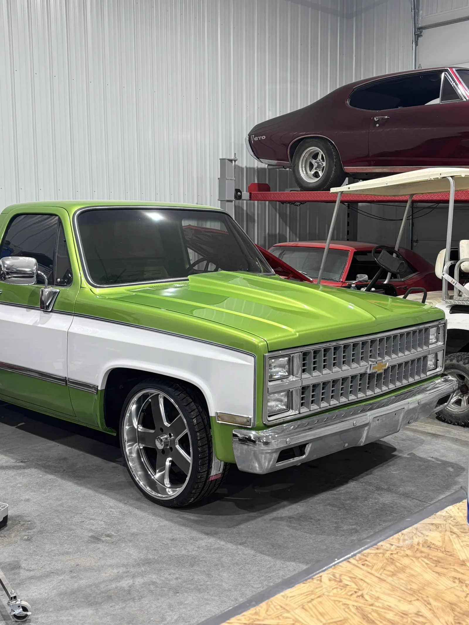 A truck restored with paintless dent repair at the Olathe shop, ready for free delivery