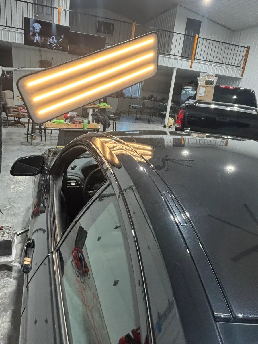 Mapping hail damage under LED line boards at our Olathe shop